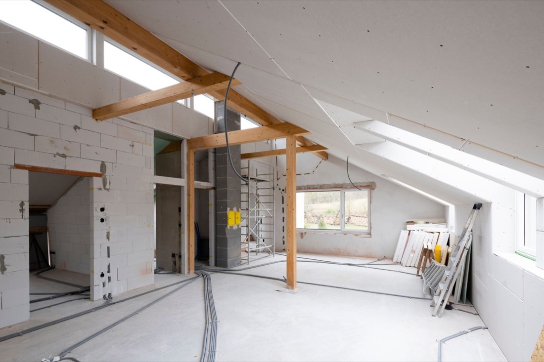 Attic converted into a bright living space with a dormer
