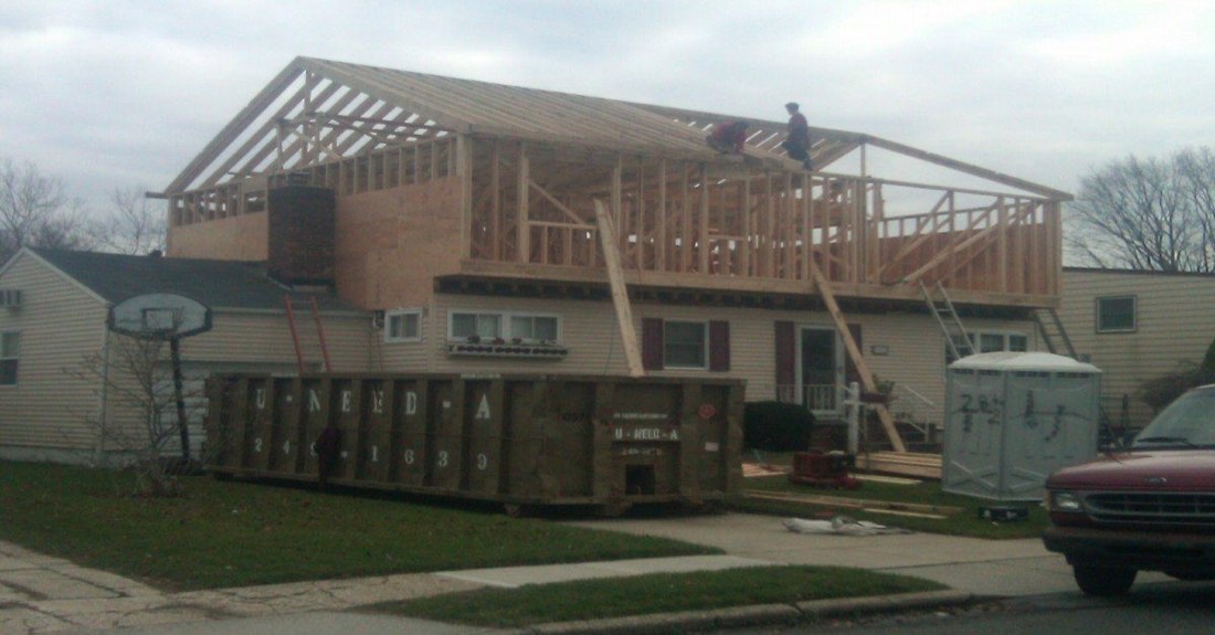Second-floor addition framed on top of a Long Island ranch by Fine Finish Construction