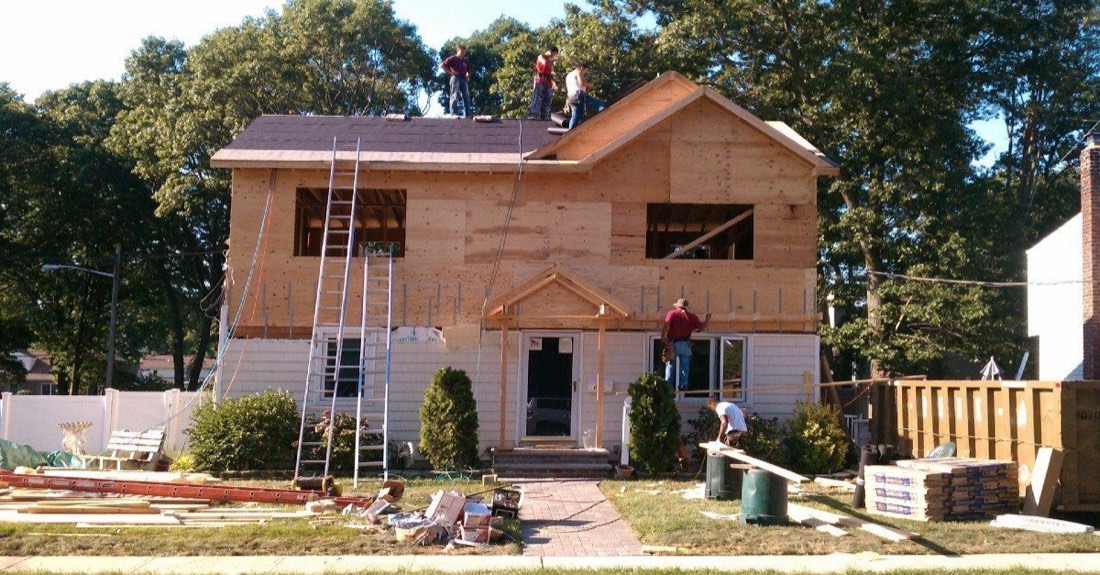 Fine Finish Construction crew building a second-story addition on a Long Island home