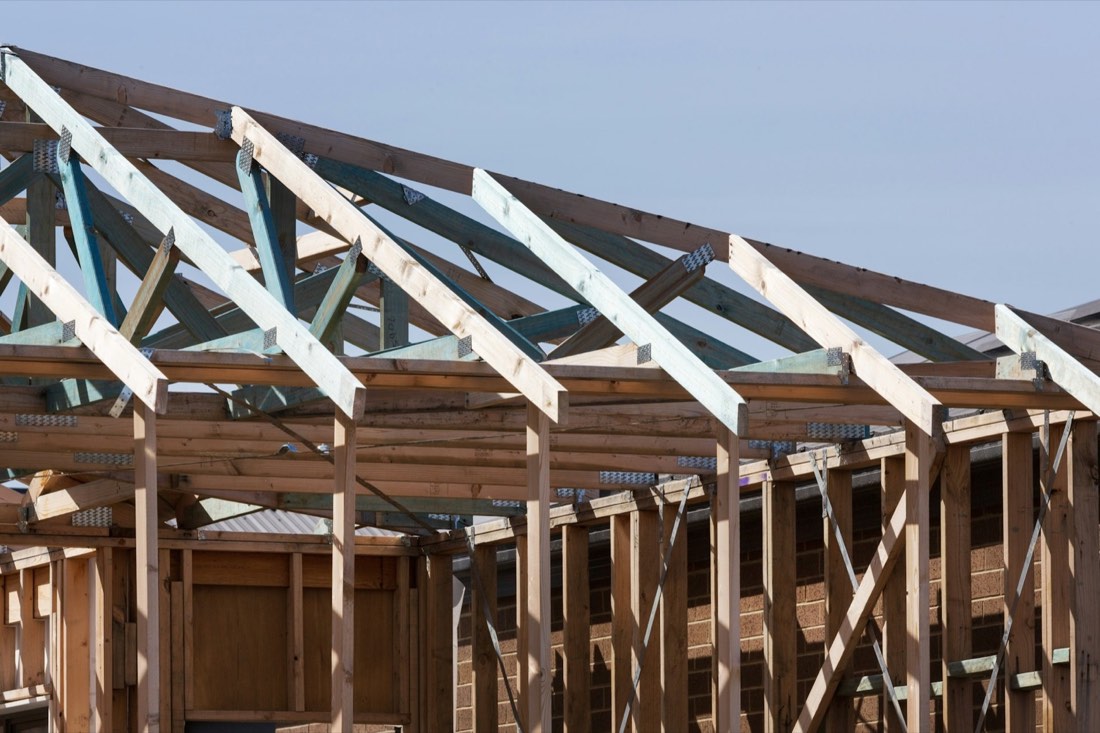 New roof trusses framed on a home addition